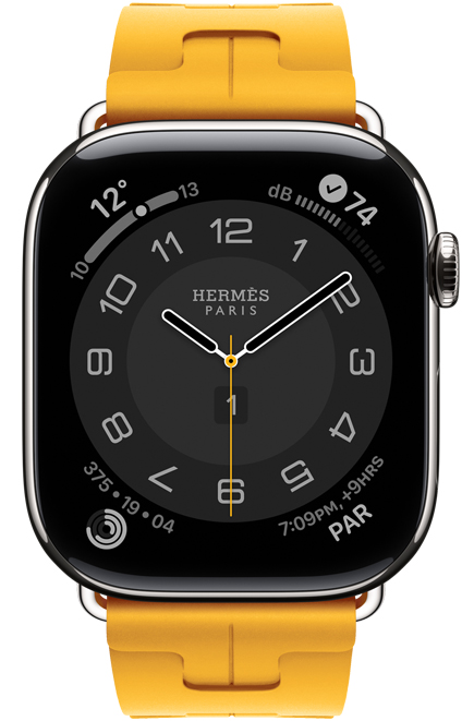 Apple Watch Hermès Series 11, Circulaire analog watch face (hour, minute, second hands, complications: Weather, activity rings, Paris time, Noise), titanium case, silver colour, right side exterior, Digital Crown, paired with Kilim Single Tour band, jaune colour (canary yellow), fluoroelastomer rubber material