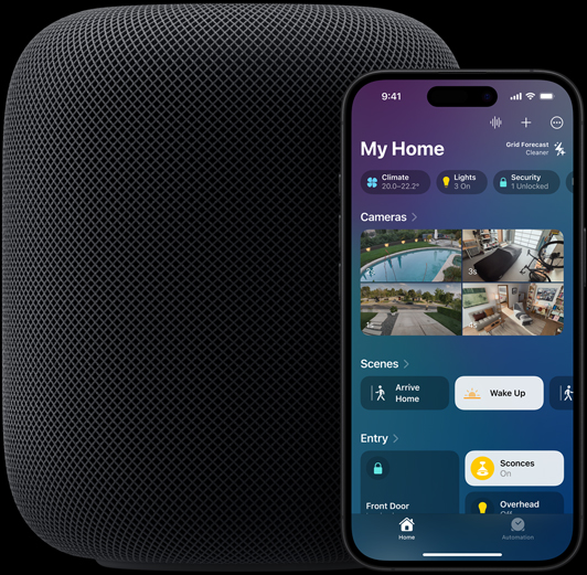 An iPhone &mdash; featuring the Home app home screen &mdash; is placed slightly in front of a HomePod speaker