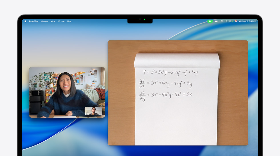 Video call on MacBook Air of a person using the Desk View feature to show a math equation to a person on the call, Desk View lets them show their workspace and their face simultaneously