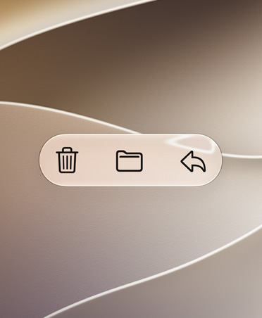 Botones de la app Mail, como Eliminar, Transferir y Responder, sobre un fondo ondulante dorado, el alto contraste hace que destaquen